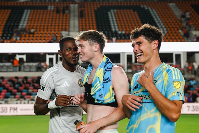 Jack McGlynn (center) talks with former Union teammates Andre Blake (left) and Jeremy Rafanello (right) after Saturday's 1-1 tie in Houston.