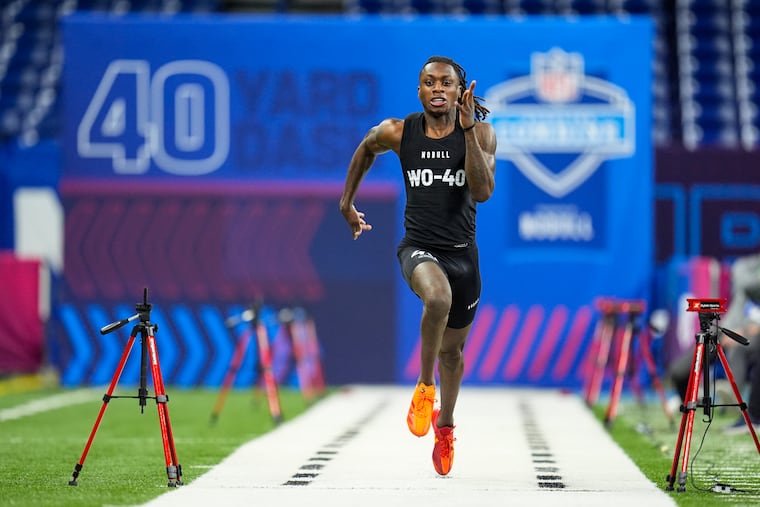 Texas wide receiver Xavier Worthy runs the 40-yard dash at the NFL Scouting Combine on Saturday.