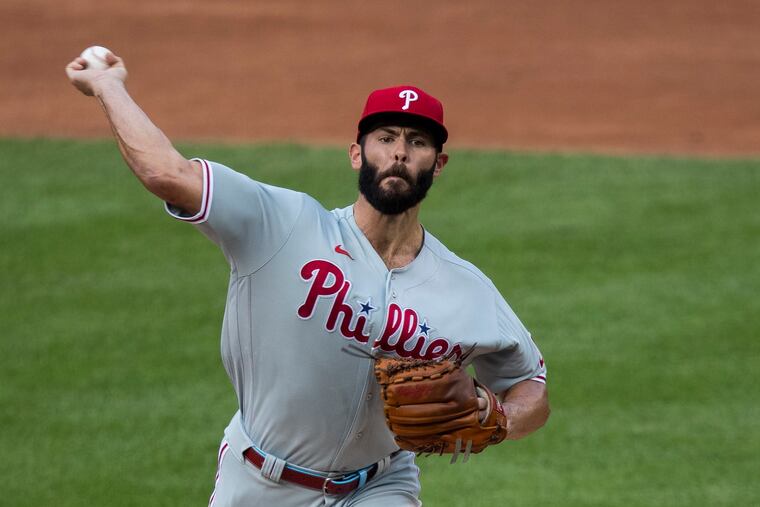 Starting pitcher Jake Arrieta throws during the first inning Tuesday.