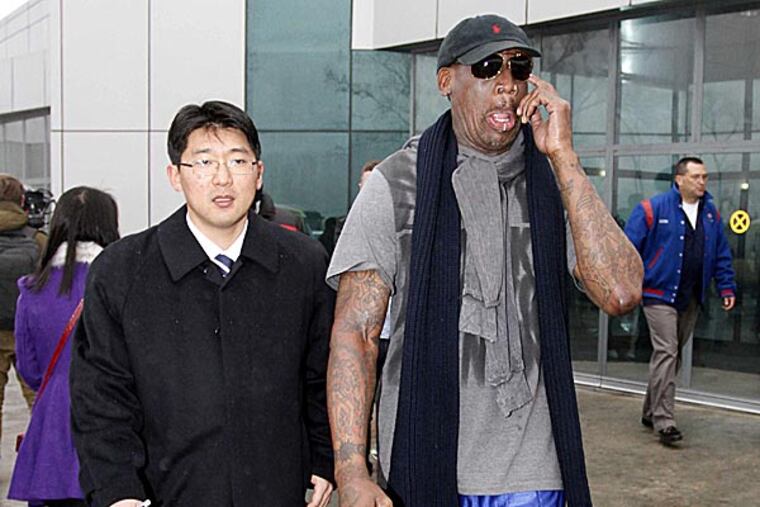 Watch out, North Korea, we've sent over our ultimate weapon. No, we're not talking about nuclear missiles. We're talkin' ex-NBA star Dennis Rodman. (Kim Kwang Hyon/AP)