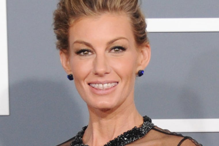 Faith Hill arrives at the 55th annual Grammy Awards on Sunday, Feb. 10, 2013, in Los Angeles. (Photo by Jordan Strauss/Invision/AP)