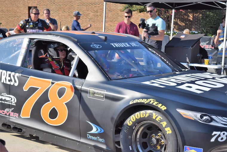 Janette Lawler sits in the No. 78 Toyota Camry waiting to drive at Dover International Speedway. She is quadriplegic