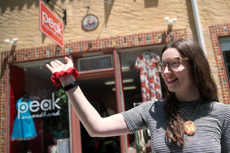 Carolyn Busa outside her new store, Peak Secondhand, on Centre Street at Maple Avenue in Merchantville. A Collingswood native, Busa built a following for her stand-up comedy in Philly and NYC.