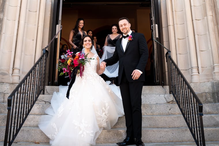 The newlyweds exit Epiphany of Our Lord in South Philadelphia. Amanda followed in the footsteps of her mother, grandmother, great-grandmother, and great-great-grandmother when she walked down Epiphany's aisle.