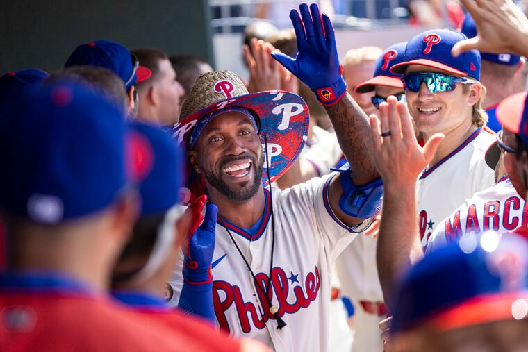 Phillies center fielder Andrew McCutchen celebrates after hitting a grand slam against the Washington Nationals on June 23.