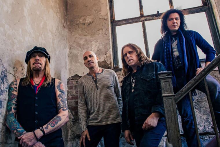 Warren Haynes (third from left) and other members of Gov't Mule, who rocked the Tower Theater.