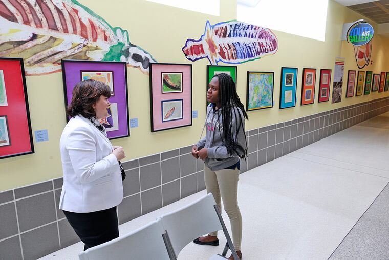 Airport CEO Chellie Cameron speaks with Diamond Alston, 14.