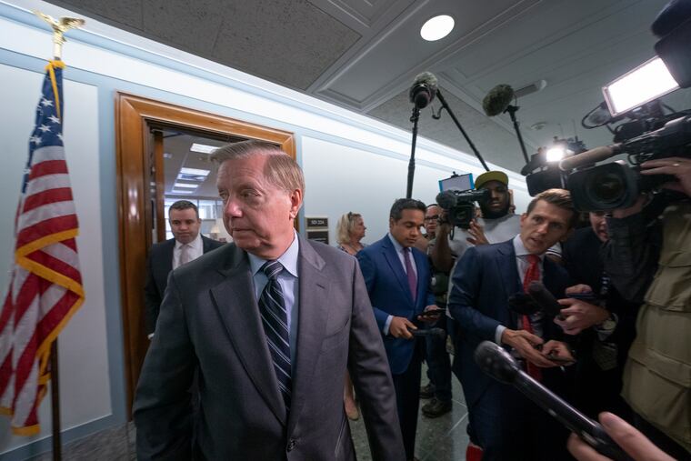 Sen. Lindsey Graham, R-S.C., chairman of the Senate Judiciary Committee, finishes his response to reporters about his earlier advice to Donald Trump Jr. on being subpoenaed by the Senate Intelligence Committee, on Capitol Hill in Washington, Tuesday, May 14, 2019. (AP Photo/J. Scott Applewhite)