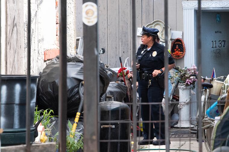 Camden Police investigate a home on 1137 Liberty Street in Camden, New Jersey where the Curtis Jenkins III, was found dead.