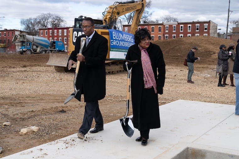 Council President Darrell L. Clarke, left, and Councilwoman Jannie Blackwell, right, walk together earlier this week after a groundbreaking at the Sharswood public housing development.