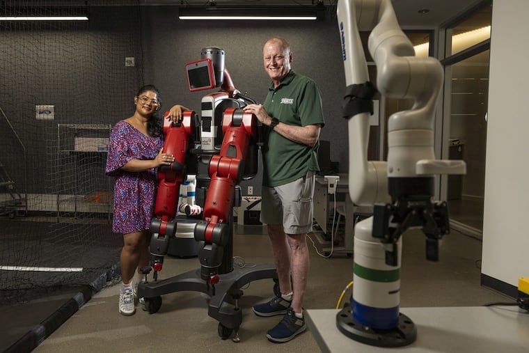 Dave Mawhinney (right), founding executive director of the Swartz Center for Entrepreneurship at Carnegie Mellon University, with Saisri Akondi, an international graduate and cofounder of the start-up D.Sole. International students “have been drivers” of Pittsburgh’s tech success, Mawhinney says.