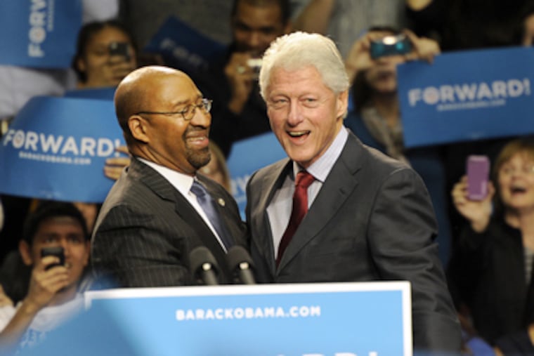 President Bill Clinton held a grassroots rally at the Palestra in Philadelphia on Monday, Nov. 5, 2012. Mayor Michael Nutter introduced Clinton to the crowd. (Sharon Gekoski-Kimmel / Staff Photographer)