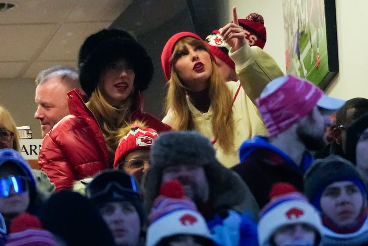 Taylor Swift, right, and Brittany Mahomes react during the third quarter of an NFL AFC division playoff football game between the Buffalo Bills and the Kansas City Chiefs on Sunday in Orchard Park, N.Y.