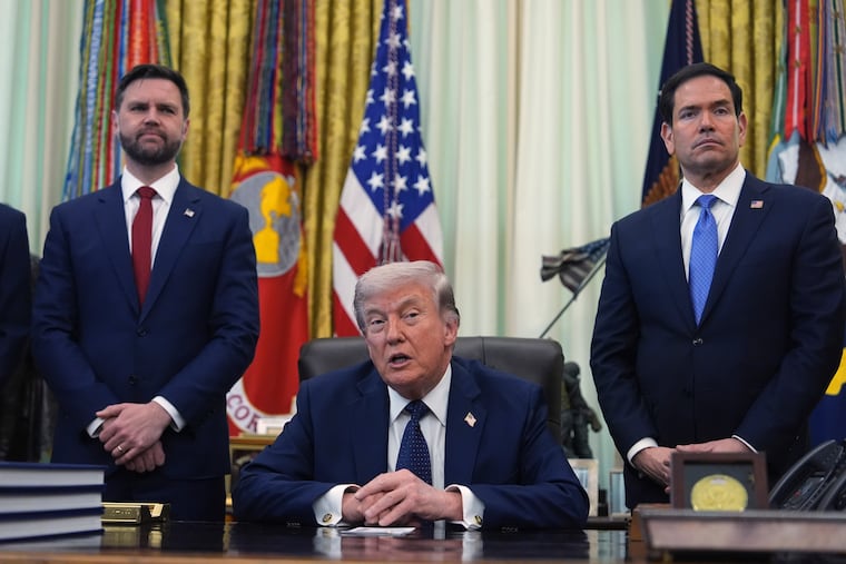 President Donald Trump speaks as Secretary of State Marco Rubio (right) and Vice President JD Vance listen Thursday in the Oval Office at the White House.