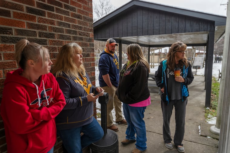 Family and friends await word of the search teams efforts in finding Cody Beverly, Kayla Williams and Erica Treadway at the Salamy Memorial Center in Whitesville, W.Va., on Wednesday, December 12, 2018. The three were reported missing Saturday night, and are stuck inside the Rock House Powellton mine. (Craig Hudson/The Charleston Gazette-Mail via AP)