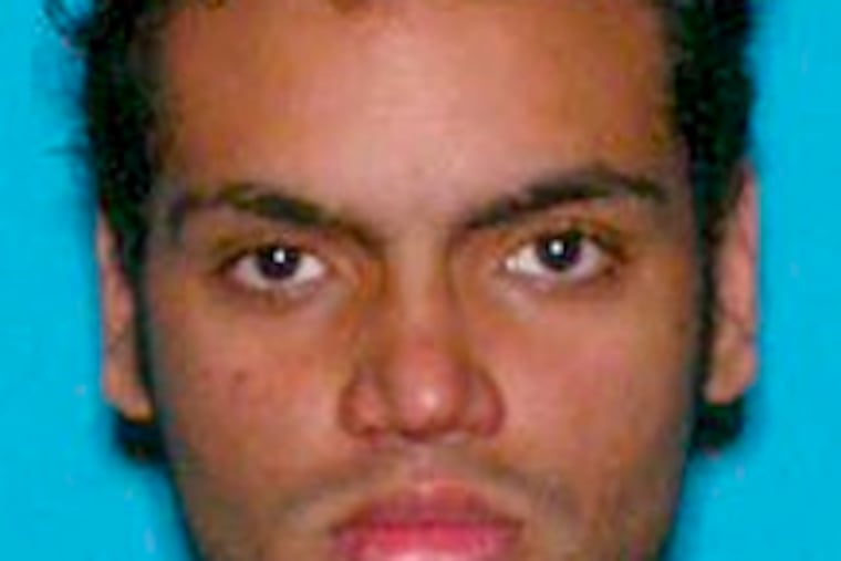 Francisco "Fongi" Herrera-Genao, left, and Wilfredo "RoboCop" Berrios are part of a group of four friends who worked at a North Brunswick, N.J., warehouse and are accused in a string of bank robberies. Three of them worked as security guards.