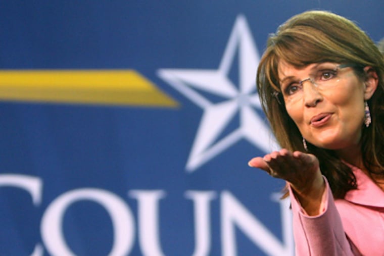 A day after abruptly announcing she would soon give up her job as governor, Palin on Saturday indicated on a social networking site that she would take on a larger, national role, citing a "higher calling" to unite the country along conservative lines. (AP Photo/Joe Burbank, Pool, File)