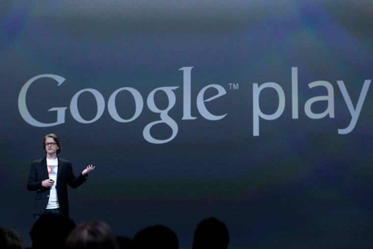 Chris Yerga, engineering director of Android, speaks about Google Play at Google I/O 2013 in San Francisco, Wednesday, May 15, 2013. (AP Photo/Jeff Chiu)