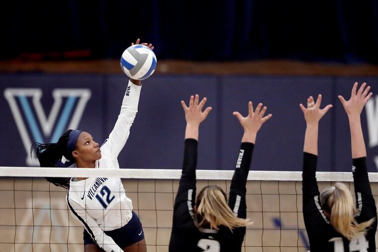 Villanova’s Sanaa Barnes returning the ball during a match against Providence.