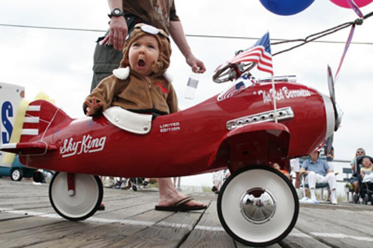 Isabella Burke, 1, of Somers Point, N.J., was the Red Baroness in the 2006 Ocean City parade. (Eric Mencher / Staff Photographer)