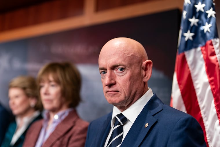 In the video, Sen. Mark Kelly and other Democrats reminded U.S. service members of their duty to disobey unlawful orders. MUST CREDIT: Al Drago/For The Washington Post