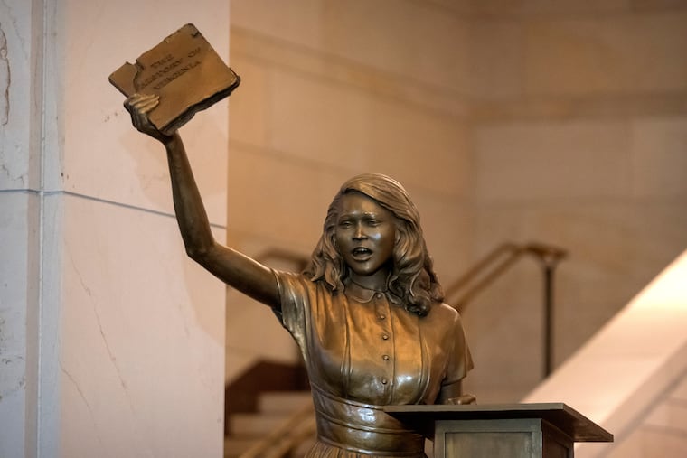 A statue of Virginia civil rights activist Barbara Rose Johns, whose statue will replace one of Robert E. Lee as one of Virginia's two statues on display at the Capitol, is unveiled Tuesday, Dec. 16, 2025, in Washington.