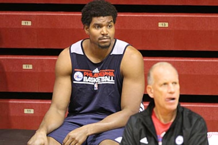 Andrew Bynum will not participate in training camp for the next three weeks to allow his knees to rest. (Charles Fox/Staff Photographer)