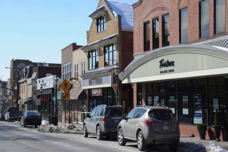 Restaurants, shops, and theaters line Butler Pike, the main thoroughfare through Ambler's downtown, which is a draw to many considering moving there. ( CLEM MURRAY / Staff Photographer )