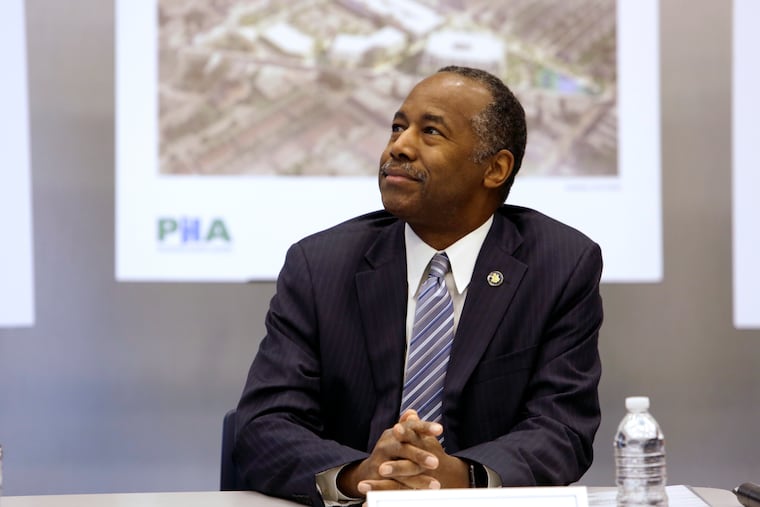 Housing and Urban Development Secretary Ben Carson watches a video presentation at the Philadelphia Housing Authority (PHA), Thursday, Feb. 14, 2019 in Philadelphia. Carson was in Philadelphia to announce the awarding of $74 million in grants to hundreds of public housing authorities across the country. (AP Photo / Jacqueline Larma)