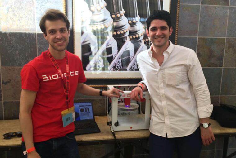 Penn grads Ricardo Solorzano (left) and Danny Cabrera of BioBots at SXSW's tech competition in Texas.