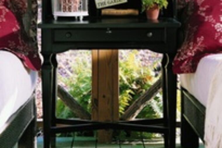 The Portofino secretary desk from Stanley Furniture has a distressed black finish, is 62 inches tall and costs $1,049.