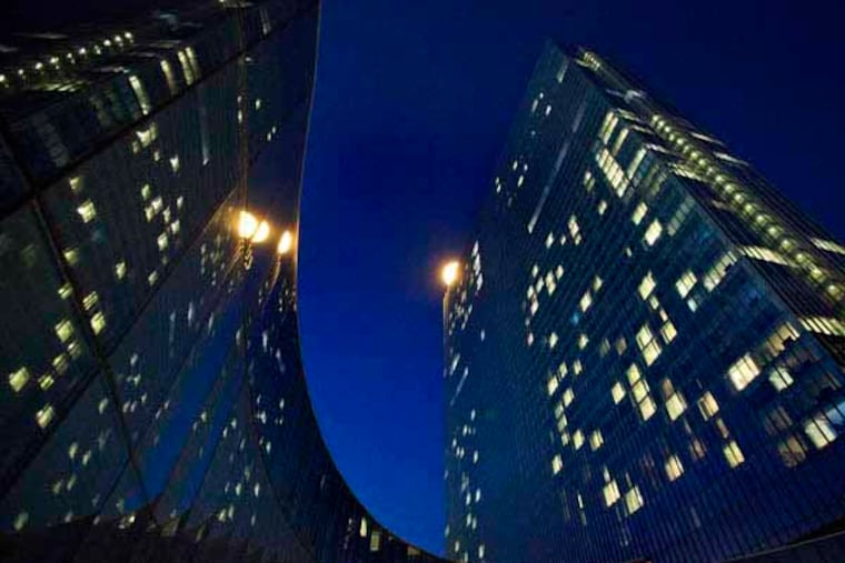 Exterior view of Revel Resorts tower (right) reflected upon lower surfaces of the building, Atlantic City, June 21, 2012. ( DAVID M WARREN / Staff Photographer ) REVEL21-D