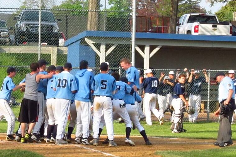 Matt Rowland jumps for joy while nearing home plate after hitting solo homer to lift Springside Chestnut Hill Academy over visiting Episcopal Academy, 3-2, in eight innings, in Inter-Ac League baseball. (Ted Silary/Staff)