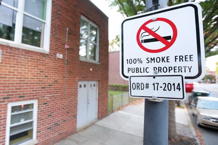 The signs declaring a smoke-free zone went up more than a week ago, surprising many.