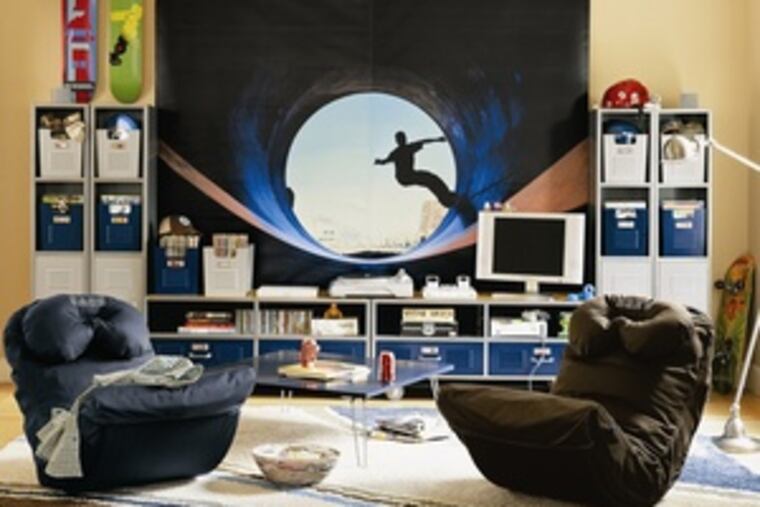 Older kids' rooms are becoming more like family rooms, designed for entertaining friends. Here, a locker-style media wall includes a console with two drawers, hardwood top. By PBteen, $599.