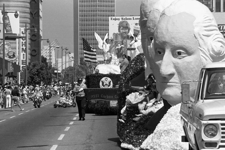 FILE - Floats and participants in the 10.8-mile All Nation, All People Official Los Angeles County Bicentennial Parade along Wilshire Boulevard in Los Angeles, Sunday, July 4, 1976. (AP Photo/File)