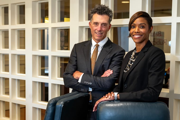 Attorneys Daniella Price and John Baldante at their law office in Center City. They recently secured a $30 million settlement on behalf of five former ballet dancers who said they were abused by their dance school teacher in North Jersey.