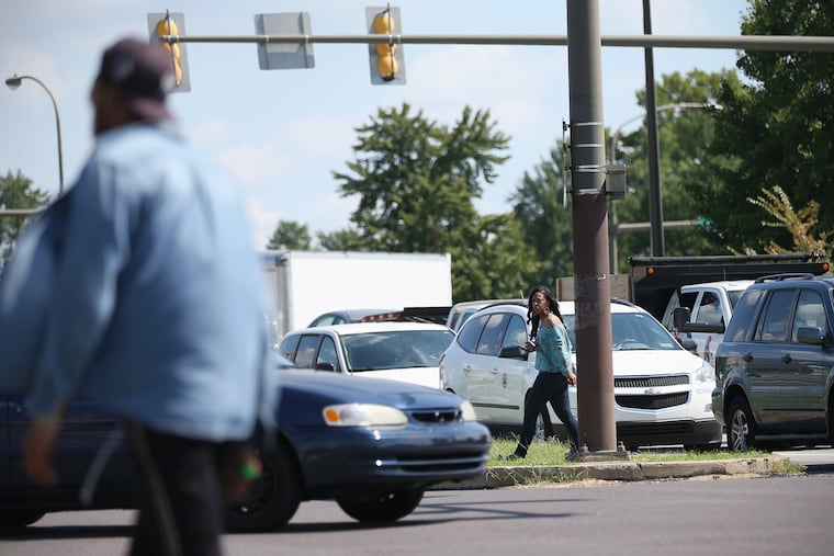 Shareena Johnson walks across on Roosevelt Boulevard at Bustleton Avenue in Northeast Philadelphia. Ten pedestrians were killed on the Boulevard, according to police data.