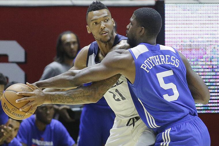 Philadelphia 76ers forward Alex Poythress (5) defends Utah Jazz forward Joel Bolomboy (21) during the first half of an NBA summer league basketball game Wednesday, July 5, 2017, in Salt Lake City.