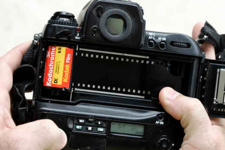 A roll of Kodachrome 64 in a film camera, a rare sight as the digital age increases and customer demand decreases. Eastman Kodak is retiring its most senior film after 74 years in production.