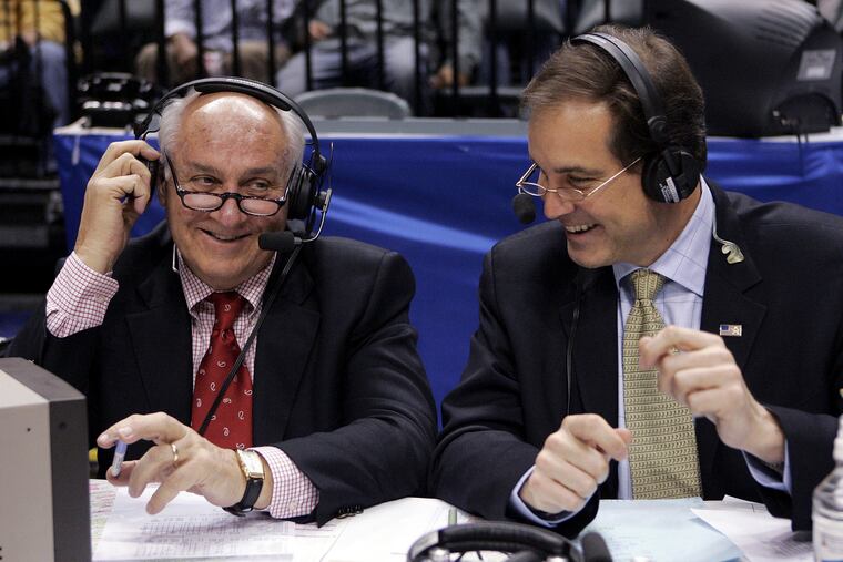 CBS announcers Billy Packer, left, and Jim Nantz laugh during a break in the championship game in the 2006 Big Ten tournament.