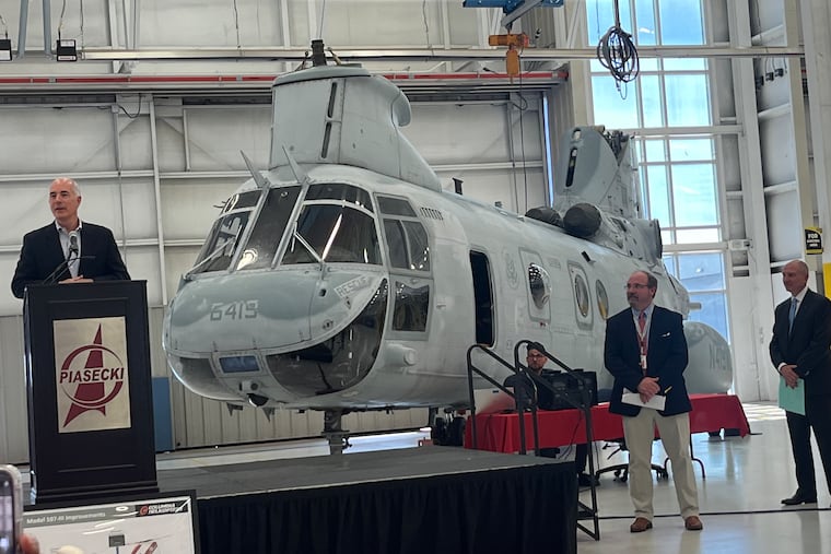 U.S. Sen. Bob Casey (left), with John W. Piasecki (center), CEO of Piasecki Aircraft Corp., and David Balevic, CEO of Oregon-based Columbia Helicopters, at Piasecki's "Heliplex" in Sadsbury Township near Coatesville. The two company leaders detailed their plans to rebuild Vietnam-era military helicopters for modern military and civilian use.