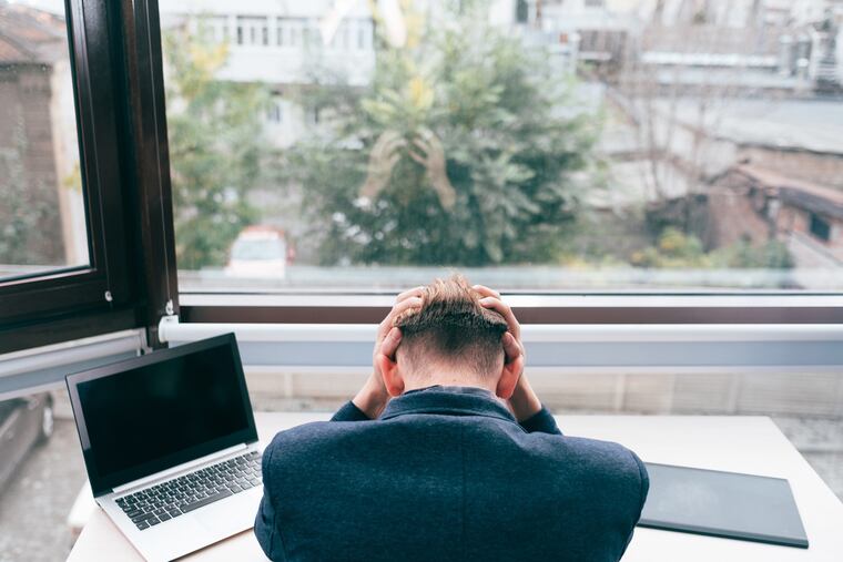 A stock image that shows a stressed worker. (Dreamstime/TNS)