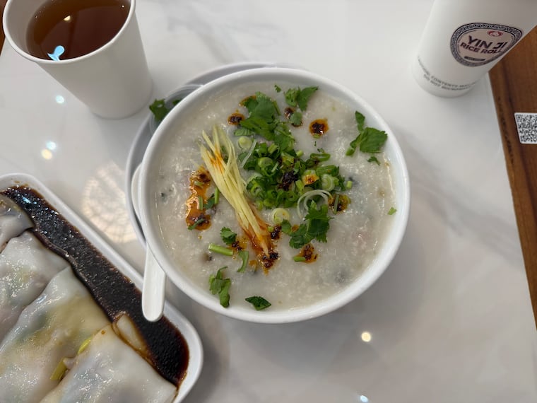 A bowl of pork and preserved egg congee
