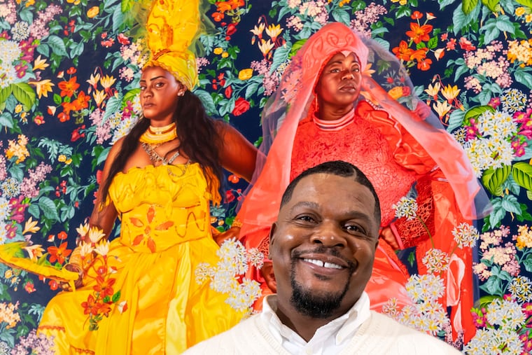 Kehinde Wiley poses with one of his works at Sean Kelly Gallery, Thursday, April 27, 2023, in New York. The State Department has removed another one of his painting from its embassy in the Dominican Republic, calling it "woke."