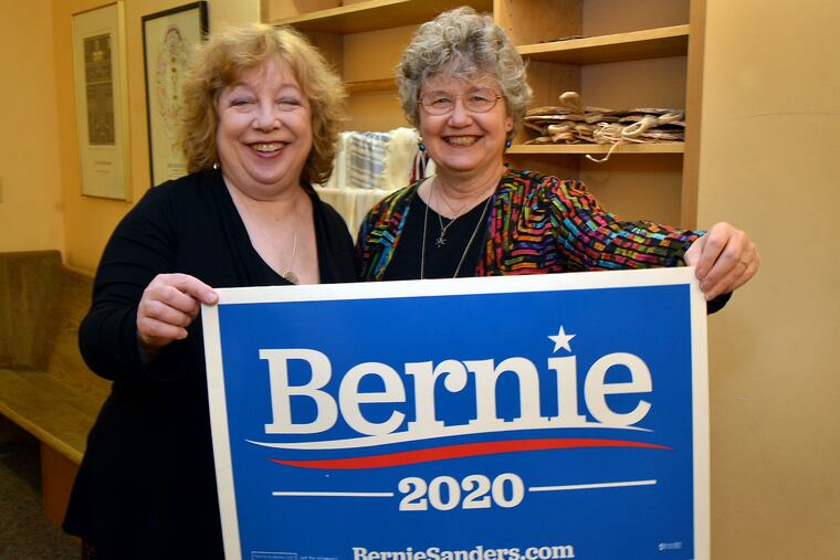 Friends Shoshana Bricklin and Susan Windle show their support for Bernie Sanders at Mishkan Shalom Synogouge in Manayunk on Feb. 25, 2020.