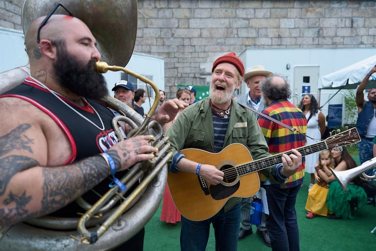 Sam Gellerstein of Philly band Snacktime backstage at the Newport Folk Festival in 2025 with Glen Hansard, the Irish singer-songwriter who died this week after a Dublin motorcycle accident. Hansard rhad been working on an as yet unreleased album with producer Charlie Hall in Conshohocken over the last two years.