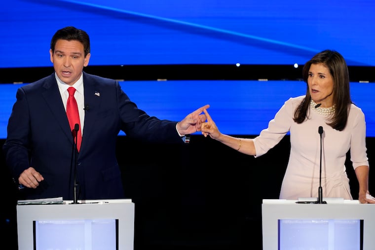 Former U.N. Ambassador Nikki Haley, right, and Florida Gov. Ron DeSantis, left, during the CNN Republican presidential debate at Drake University in Des Moines, Iowa, on Wednesday, Jan. 10, 2024.