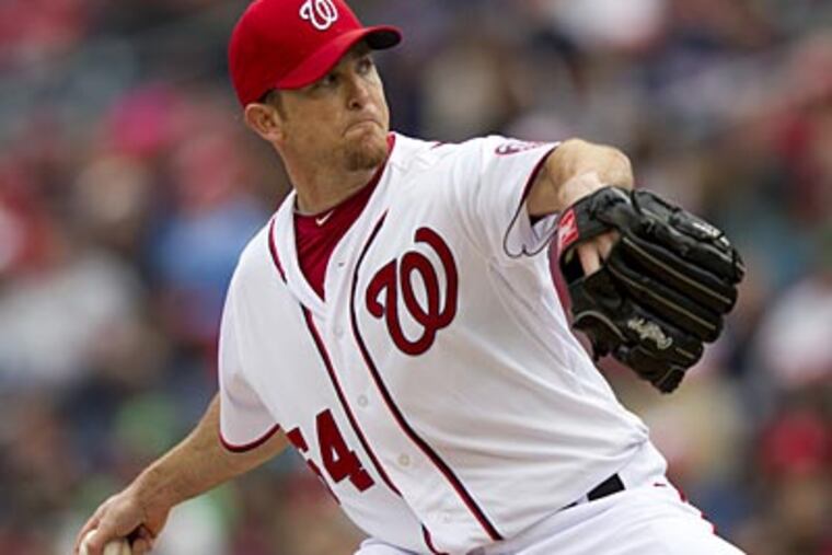 Brad Lidge recorded a 9.64 ERA in 11 appearances before the Nationals designated him for assignment. (Evan Vucci/AP)