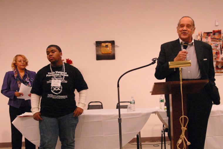 The Rev. J.A. Jones speaks at the antiviolence forum at First Nazarene. Behind him are Veronica L. Wynn, a director at the Camden Center for Youth Development, and youth leader Kimel Hadden.